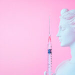 a statue with a injection